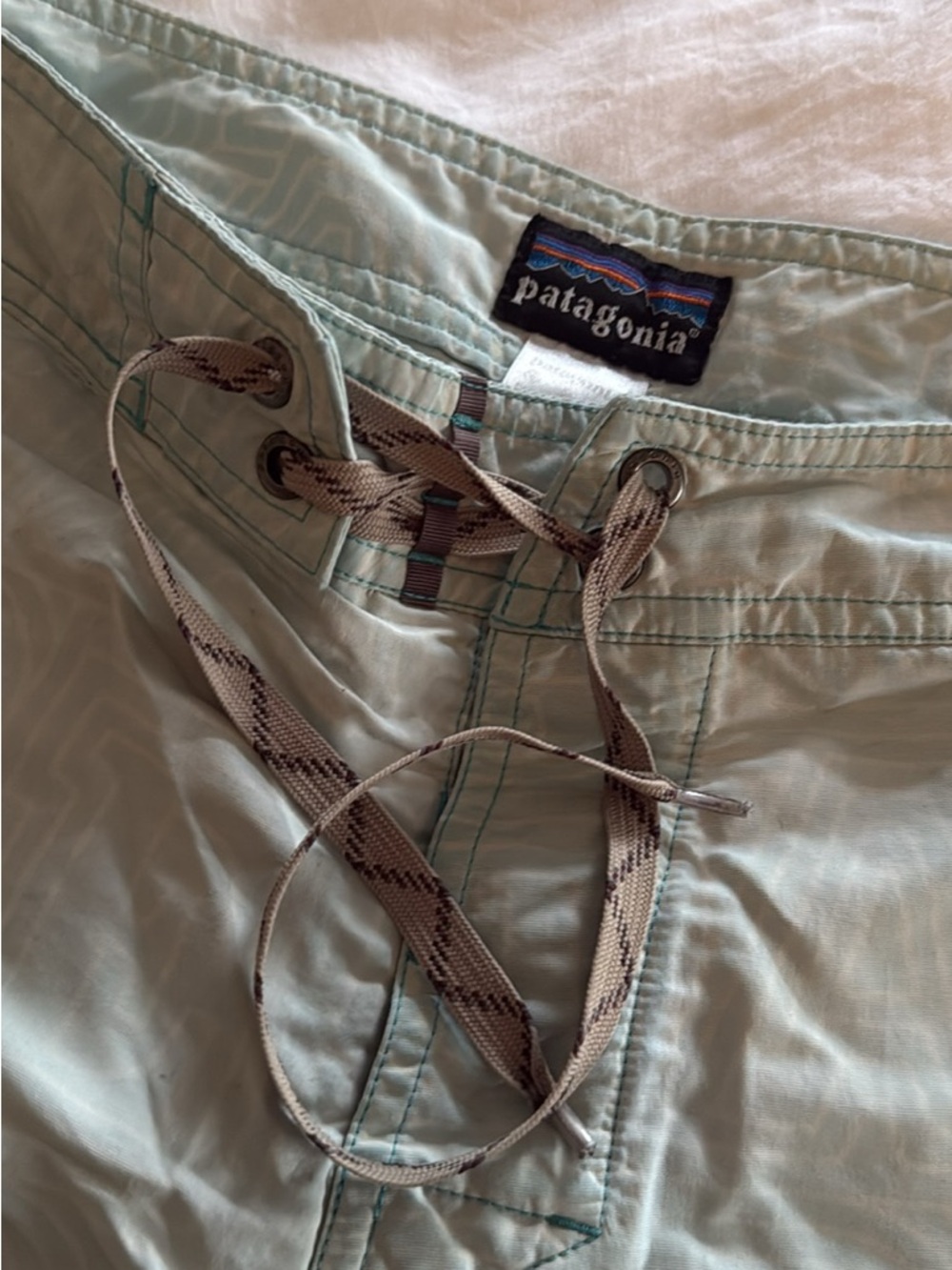 Patagonia Seafoam Green Board Shorts with Beige Drawstring